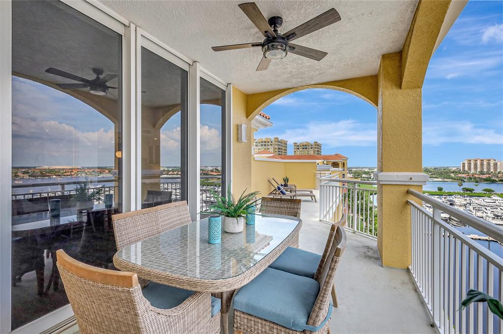 610 Riviera Dunes Way, Unit 602 Palmetto, FL 34221 - Photo 64 of 79 a view of a dining room with furniture window and outside view