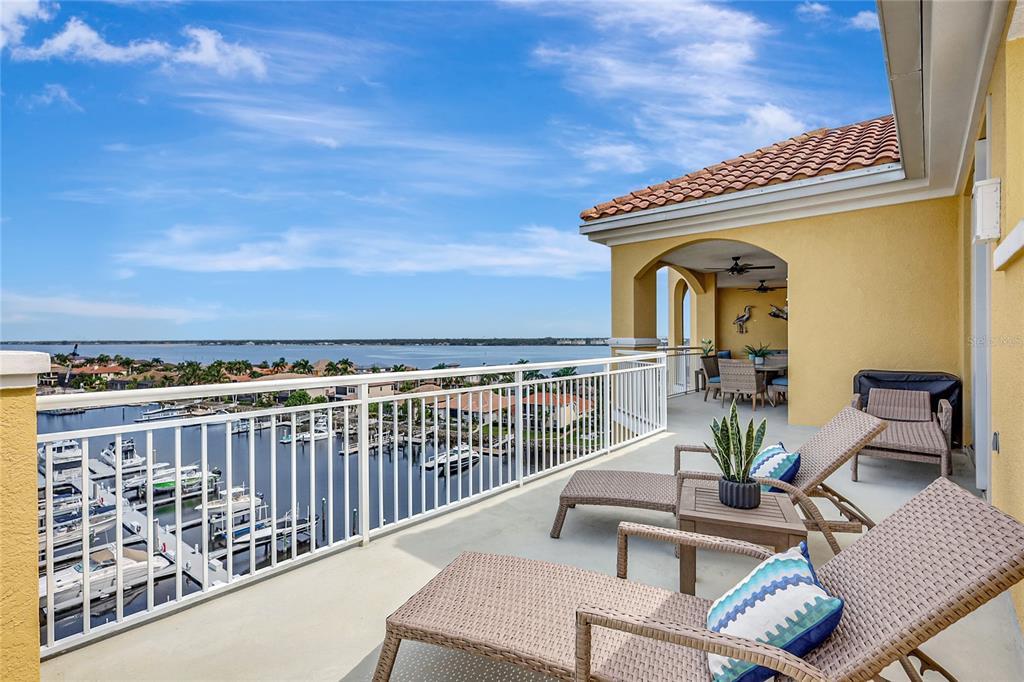 610 Riviera Dunes Way, Unit 602 Palmetto, FL 34221 - Photo 70 of 79 a view of a balcony with furniture