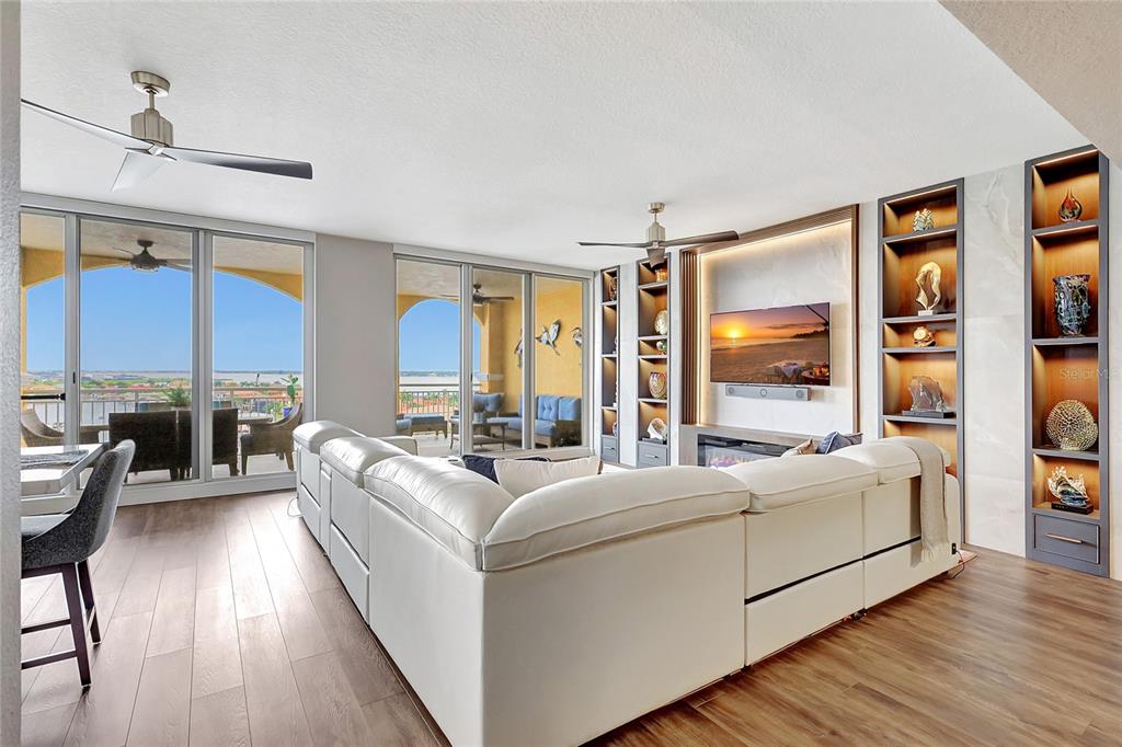 610 Riviera Dunes Way, Unit 602 Palmetto, FL 34221 - Photo 10 of 79 a living room with furniture and large window
