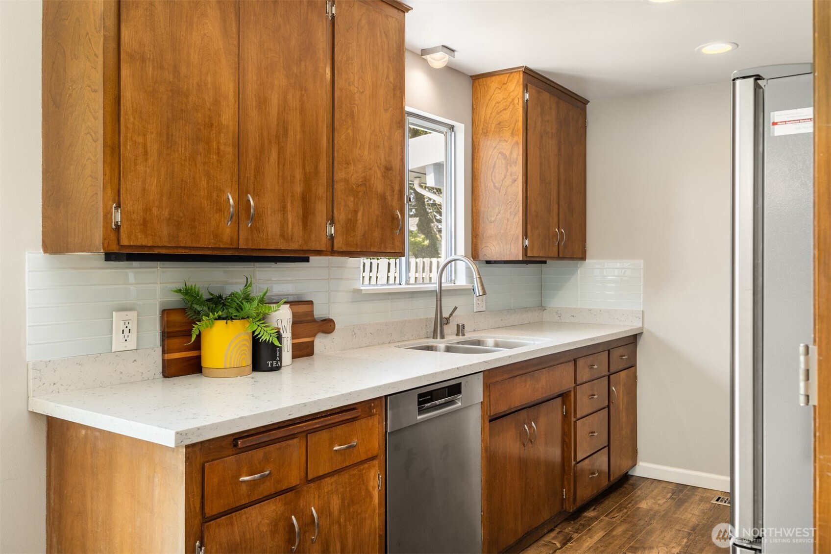 16021 15th Avenue Southwest Burien, WA 98166 - Photo 12 of 36 a kitchen with a sink cabinets and a window
