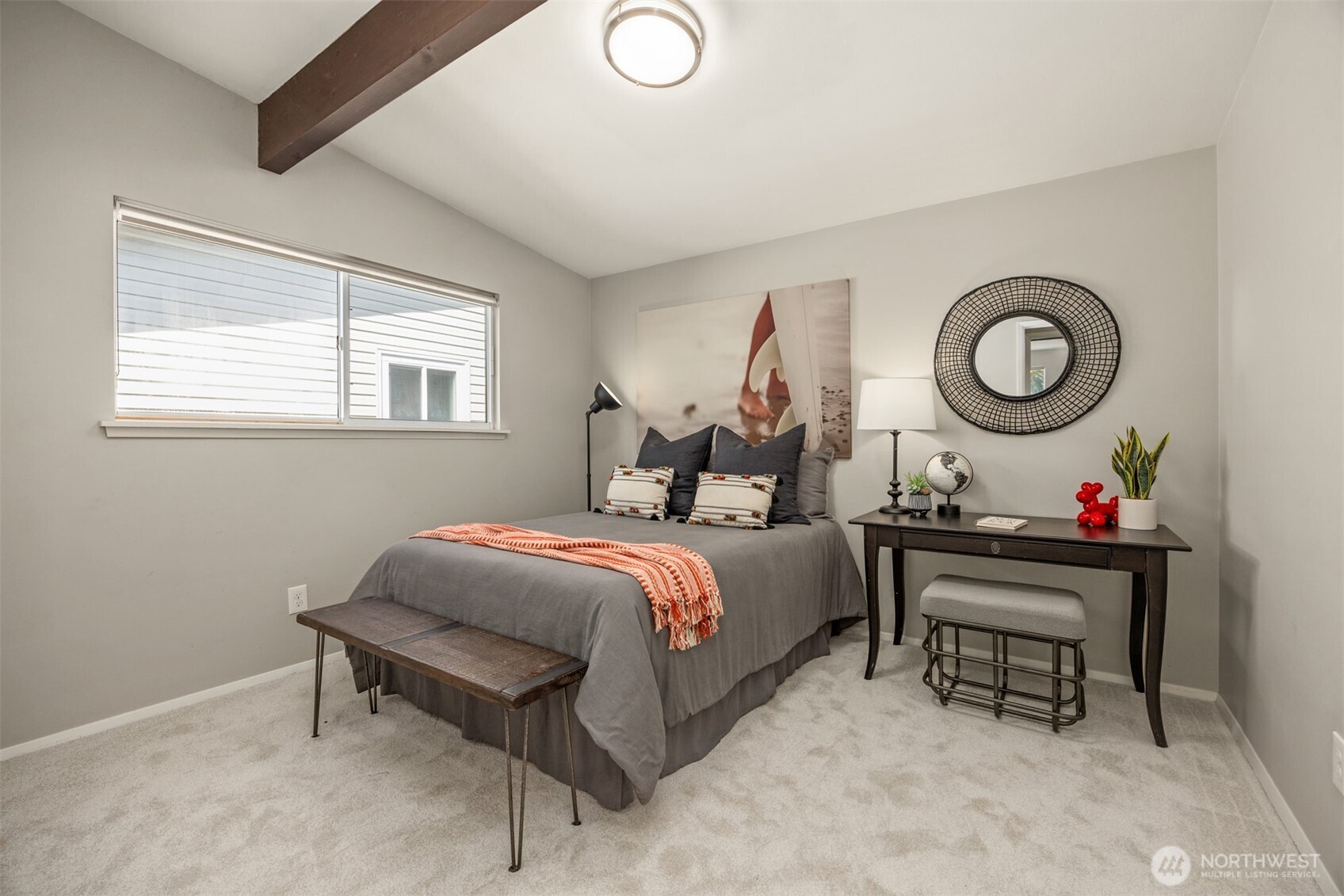 16021 15th Avenue Southwest Burien, WA 98166 - Photo 18 of 36 a bed room with a bed and a chair