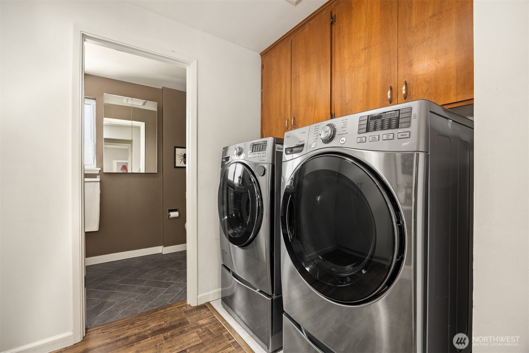 16021 15th Avenue Southwest Burien, WA 98166 - Photo 23 of 36 a view of a hallway with washer and dryer