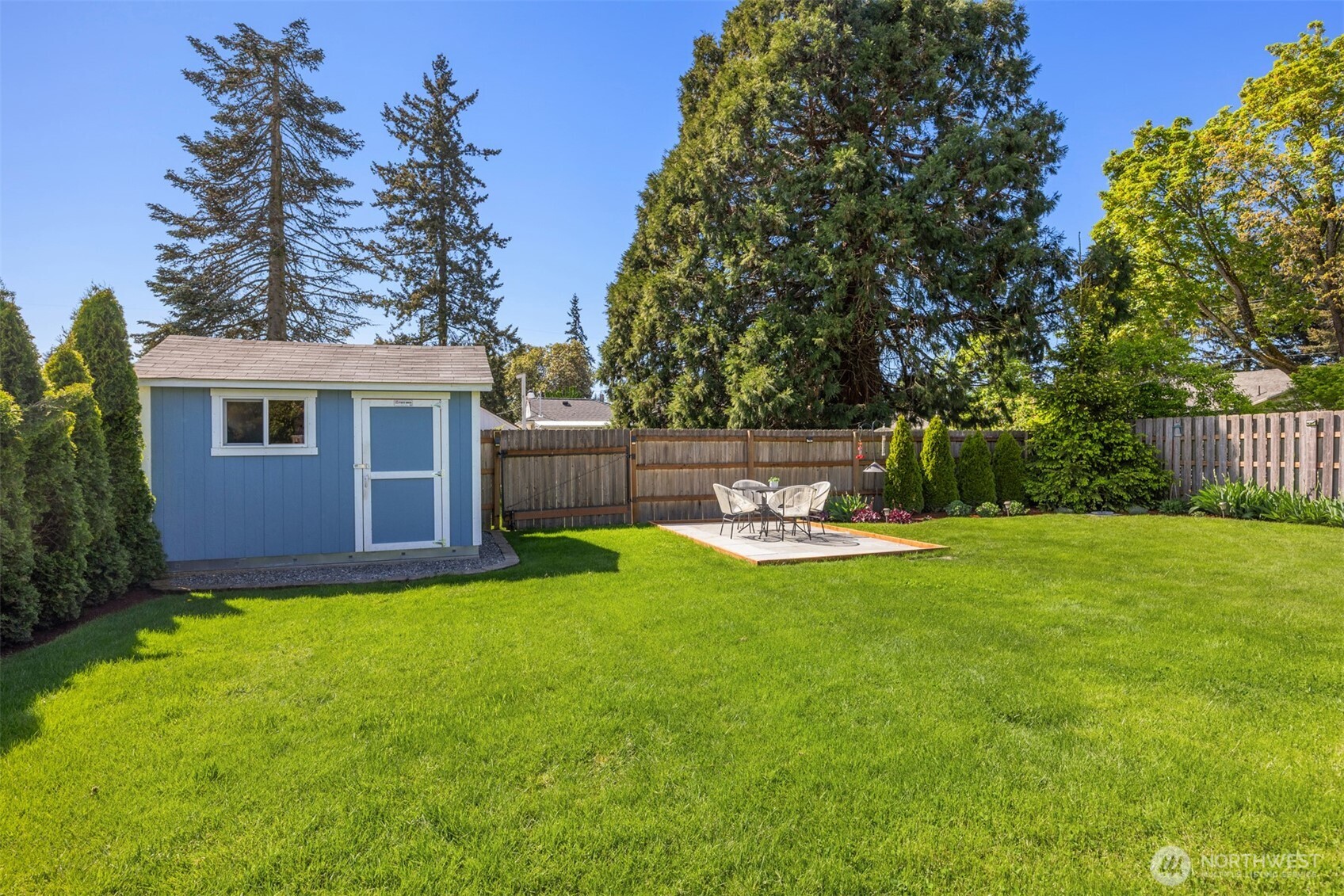 16021 15th Avenue Southwest Burien, WA 98166 - Photo 29 of 36 a view of backyard with swimming pool and seating space