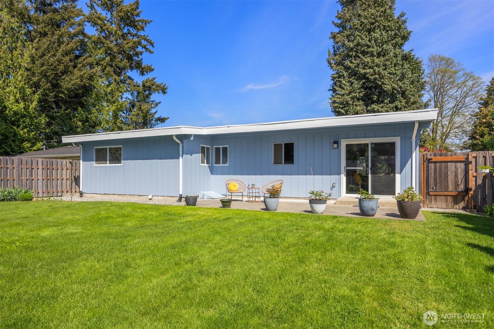 16021 15th Avenue Southwest Burien, WA 98166 - Photo 31 of 36 a house view with a sitting space and garden