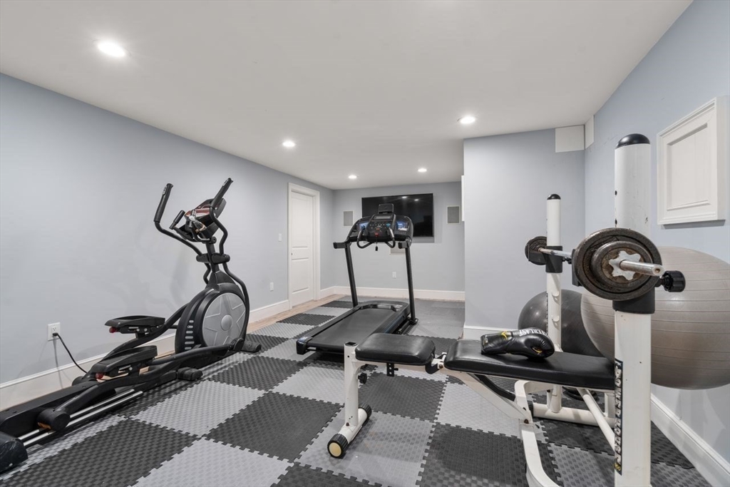 56 Blossomcrest Road Lexington, MA 02421 - Photo 25 of 29 a view of a room with gym equipment