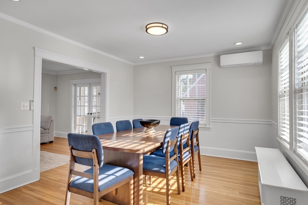 10 Dexter Road Lexington, MA 02420 - Photo 13 of 35 a view of a dining room with furniture and wooden floor