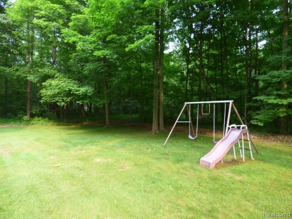 11483 Mcgregor Road Pinckney, MI 48169 - Photo 25 of 26 26 YARD.jpg