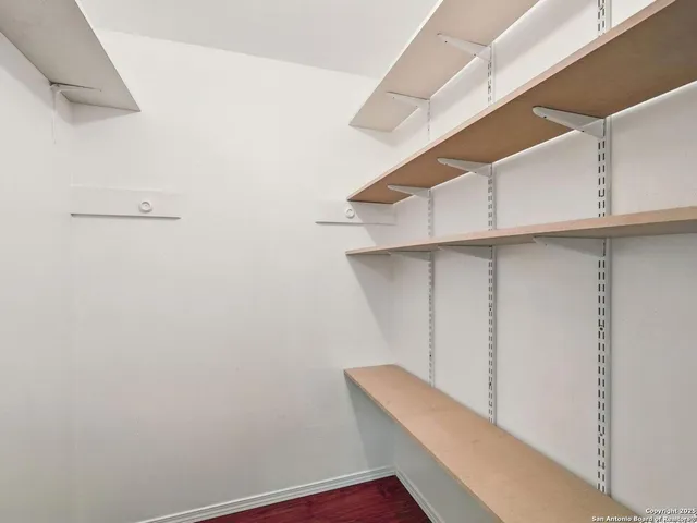 a view of small space with racks on the wall