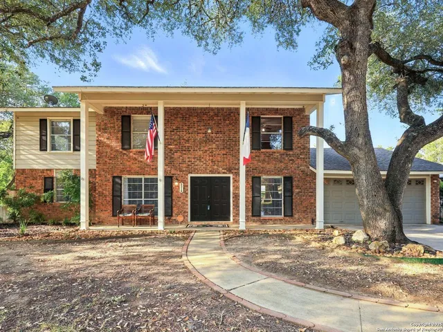 front view of a house with a dry yard