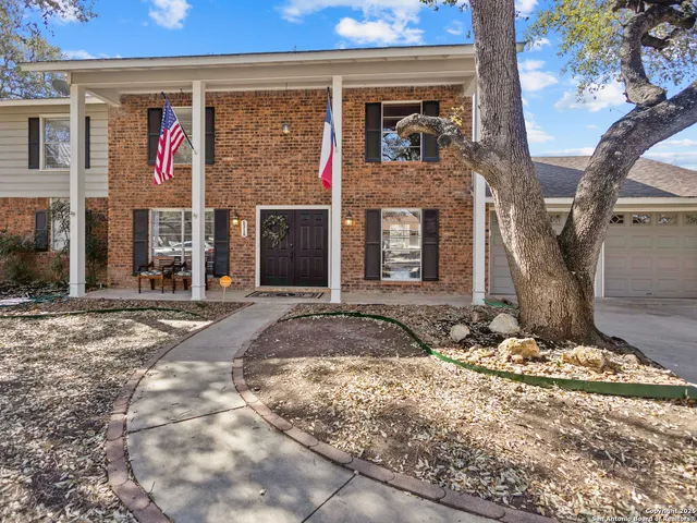 a front view of a building with retail shops