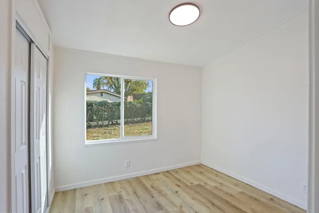 an empty room with window