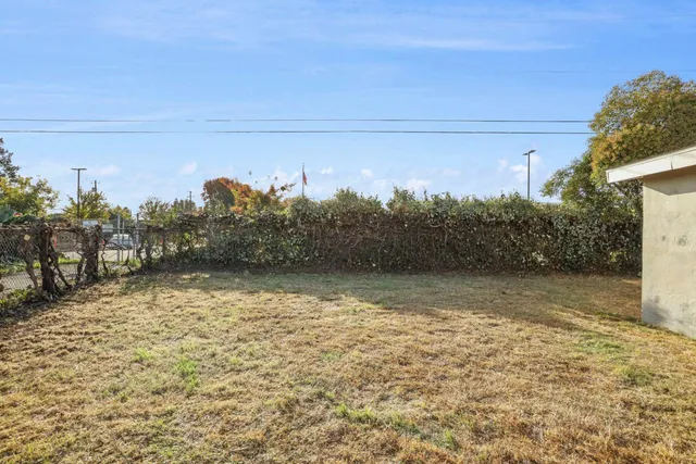 a view of backyard of house