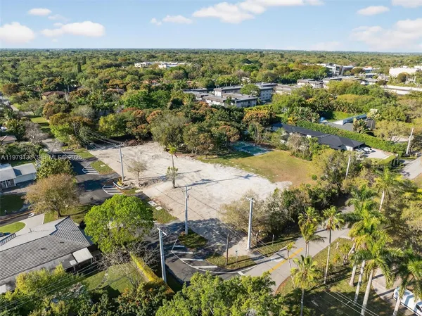 a view of a lake with a building in the background