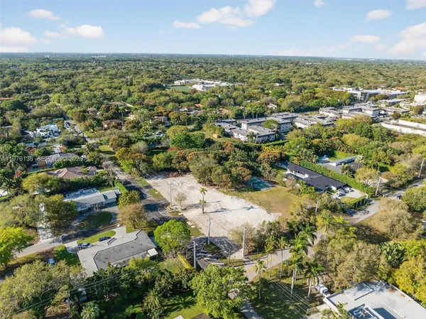 an aerial view of residential building with parking space