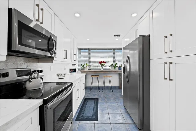 $370,000 | 630 Northeast 20th Lane, Boynton Beach, FL 33435