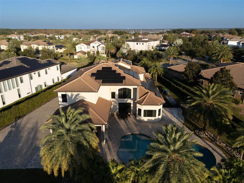4303 Isabella Circle Windermere, FL 34786 - Photo 15 of 77 an aerial view of a house with a lake view