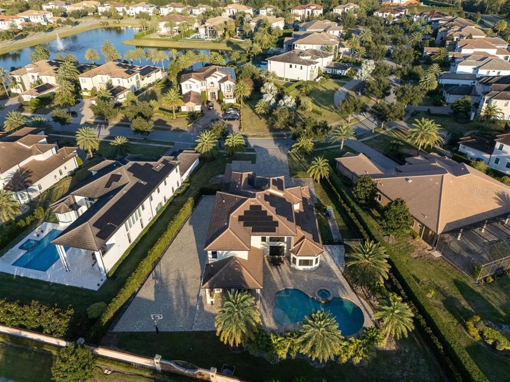4303 Isabella Circle Windermere, FL 34786 - Photo 16 of 77 an aerial view of a residential houses with outdoor space