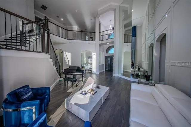 a kitchen with stainless steel appliances a sink a stove and a refrigerator