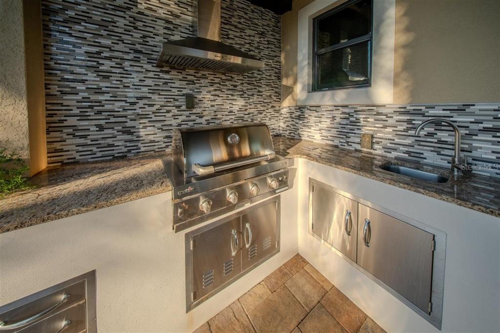4303 Isabella Circle Windermere, FL 34786 - Photo 42 of 77 a close view of a stove top oven and sink