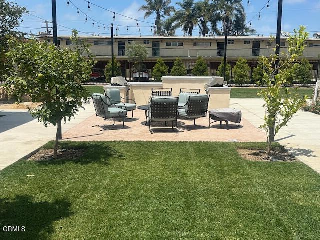 307 North F Street, Unit 102 Oxnard, CA 93030 - Photo 4 of 12 a view of a backyard with sitting area