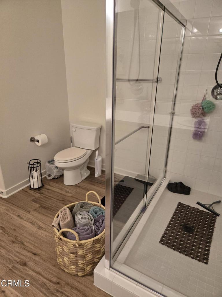 307 North F Street, Unit 102 Oxnard, CA 93030 - Photo 10 of 12 a bathroom with a sink and a toilet