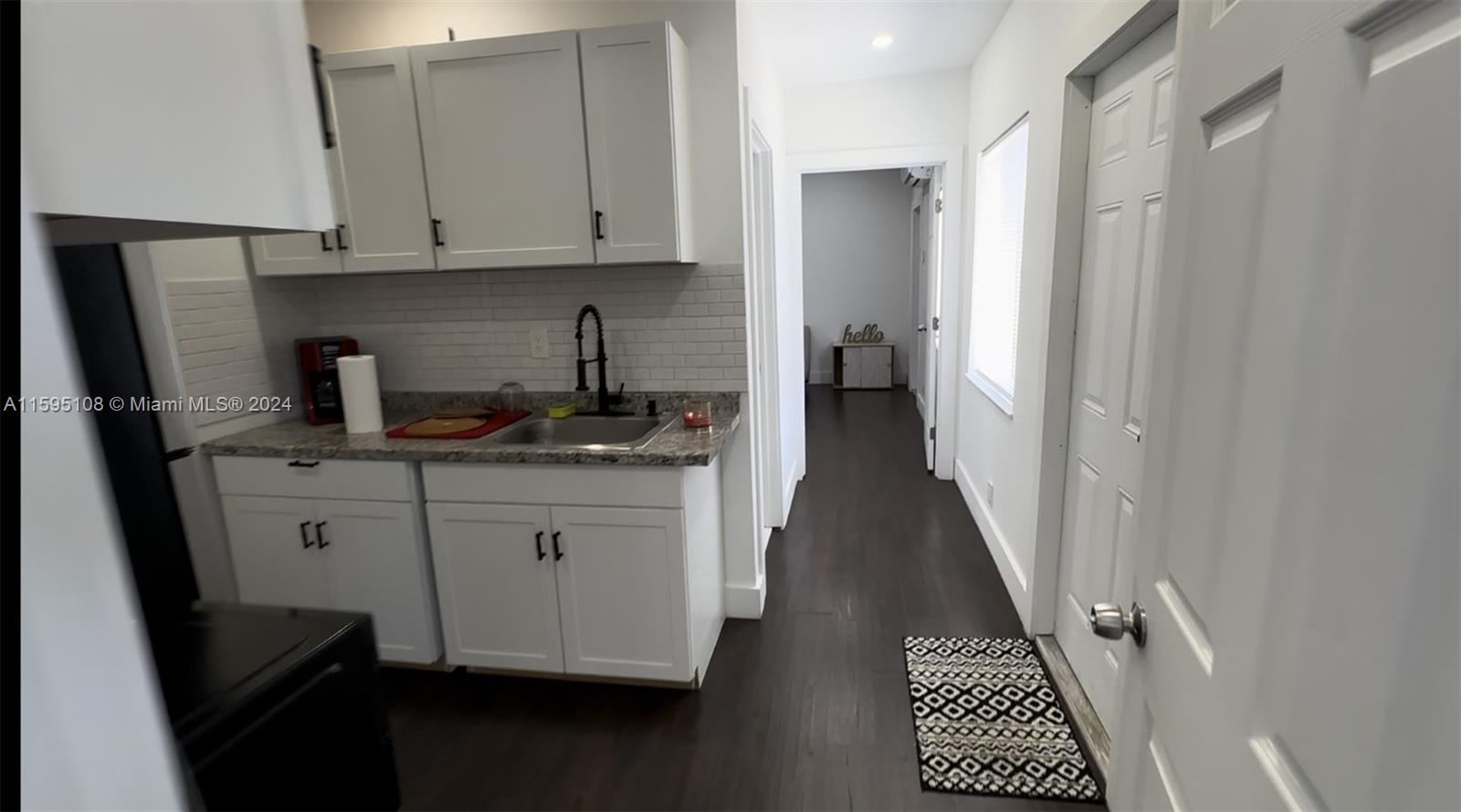 923 Southwest 13th Court Miami, FL 33135 - Photo 32 of 58 BACK UNIT KITCHENETTE