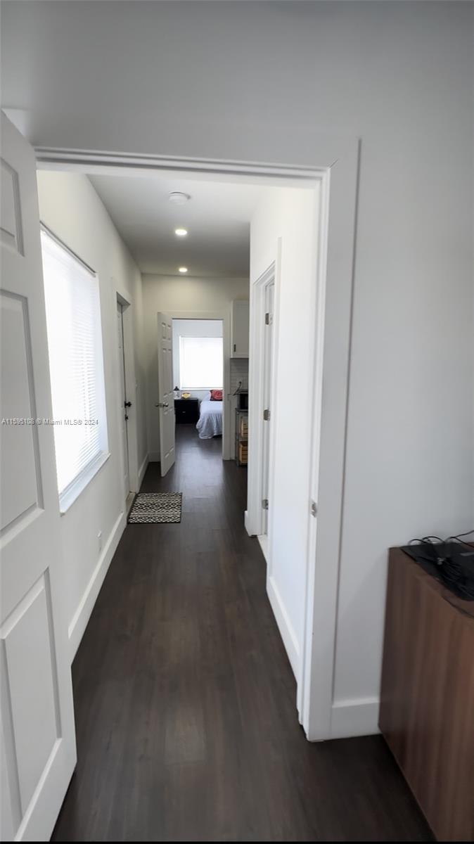 923 Southwest 13th Court Miami, FL 33135 - Photo 35 of 58 a view of a hallway with furniture and a window