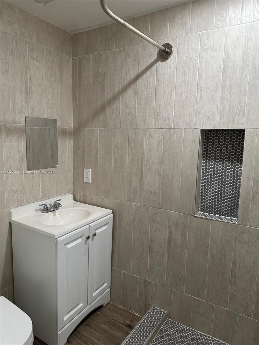 923 Southwest 13th Court Miami, FL 33135 - Photo 39 of 58 a utility room with dryer and washer