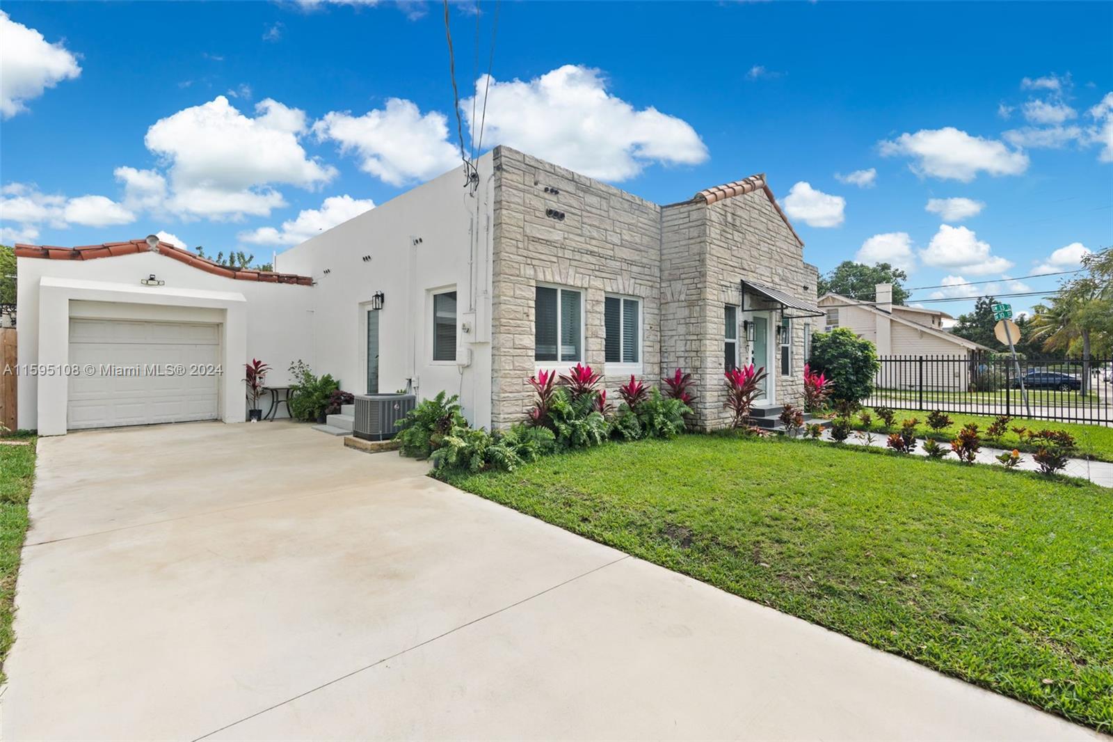 923 Southwest 13th Court Miami, FL 33135 - Photo 6 of 58 a front view of house with yard