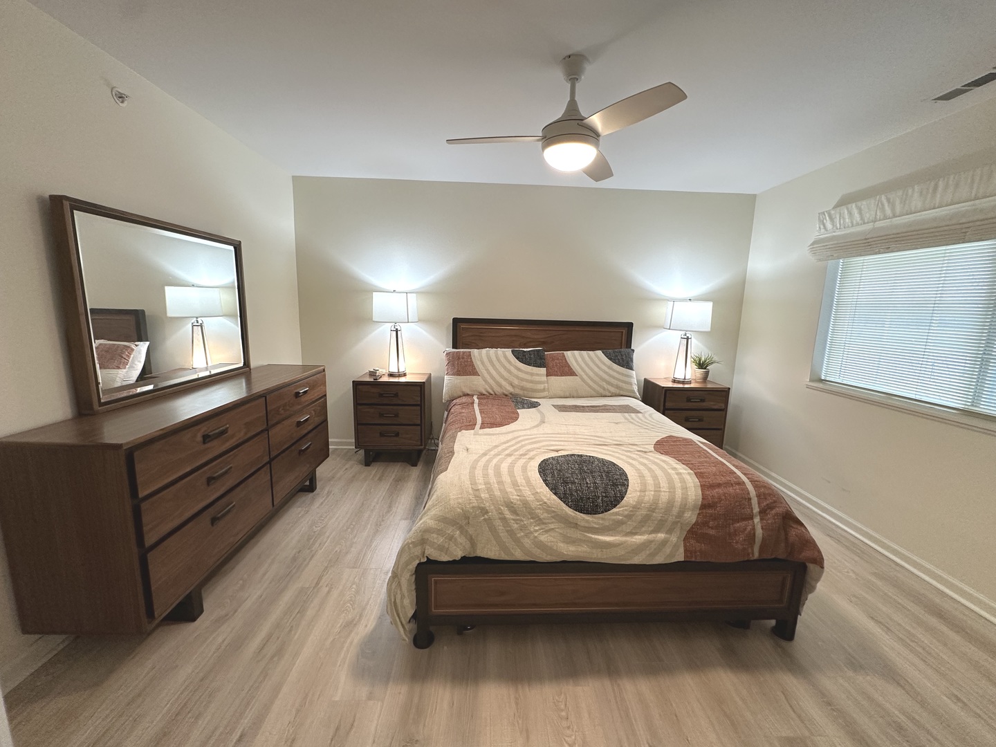 5102 Monroe Street Matteson, IL 60443 - Photo 30 of 54 a spacious bedroom with a bed and a dresser