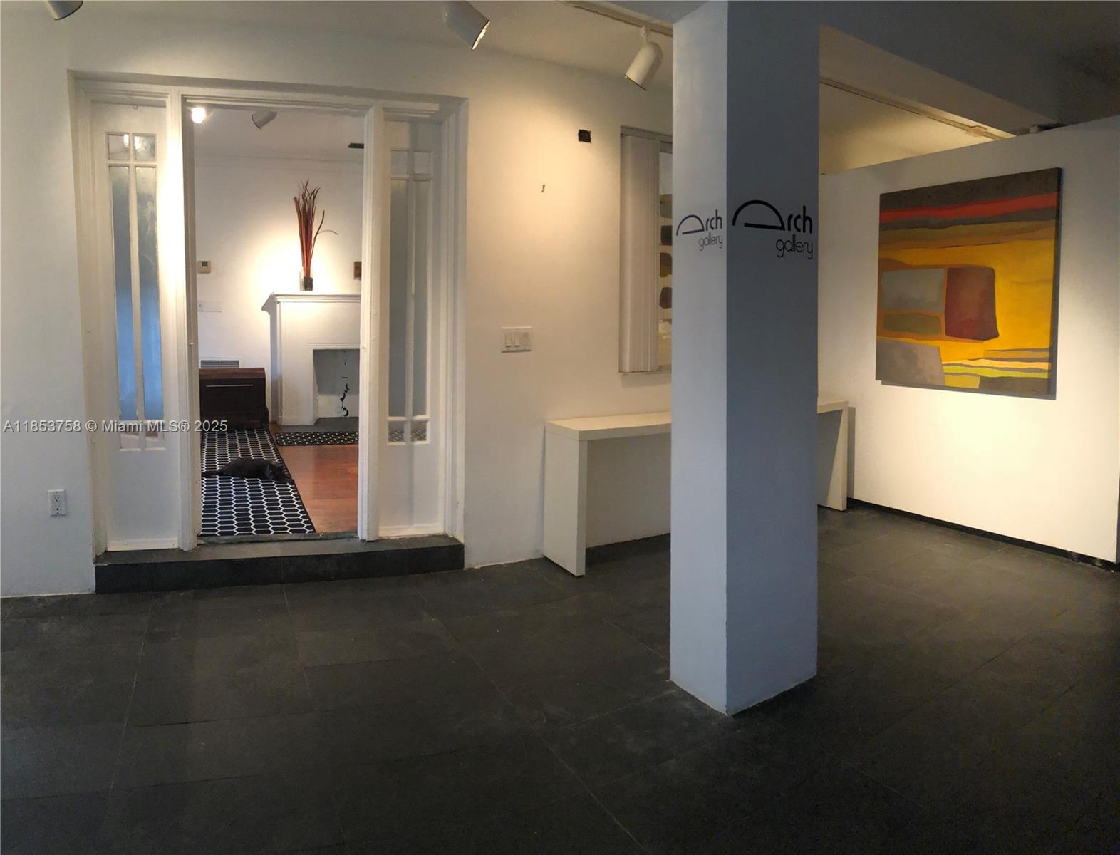 1619 Southwest 13th Street Miami, FL 33145 - Photo 11 of 46 a view of a bathroom with a glass door and a window