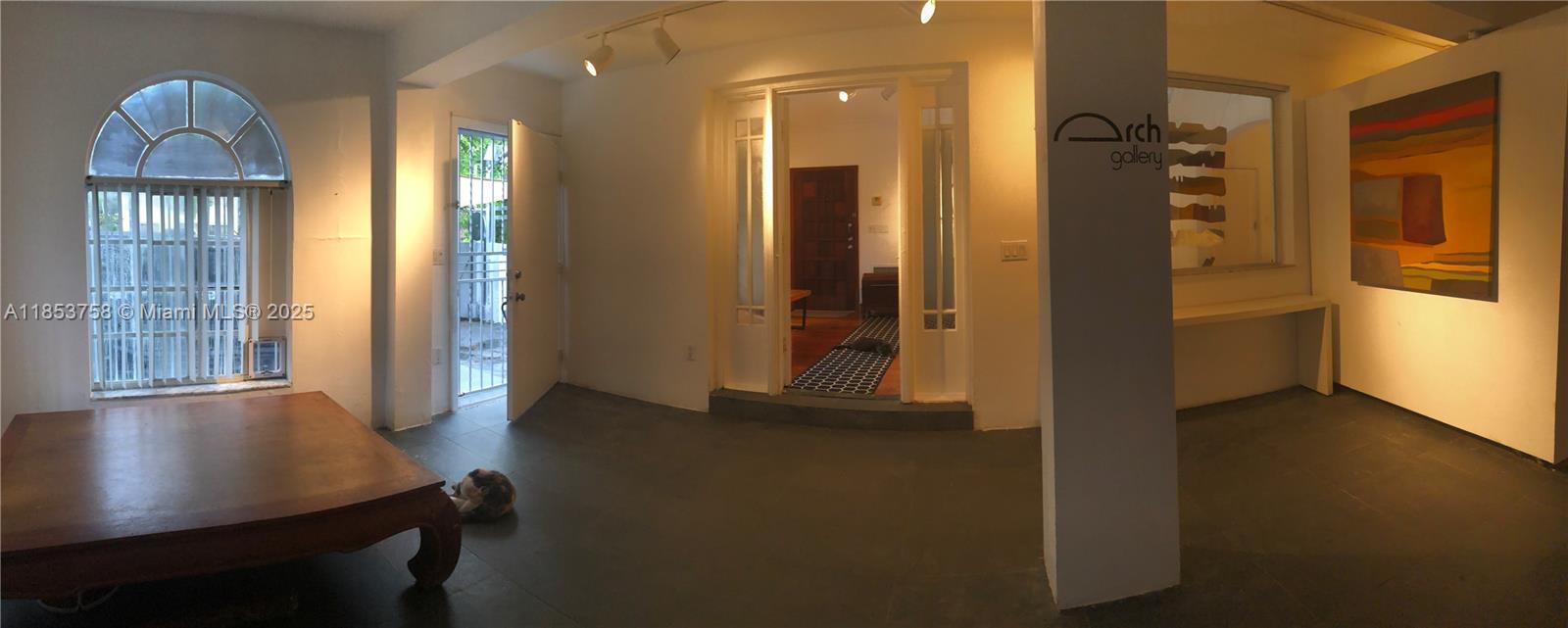 1619 Southwest 13th Street Miami, FL 33145 - Photo 14 of 46 wooden floor in a hall with a window