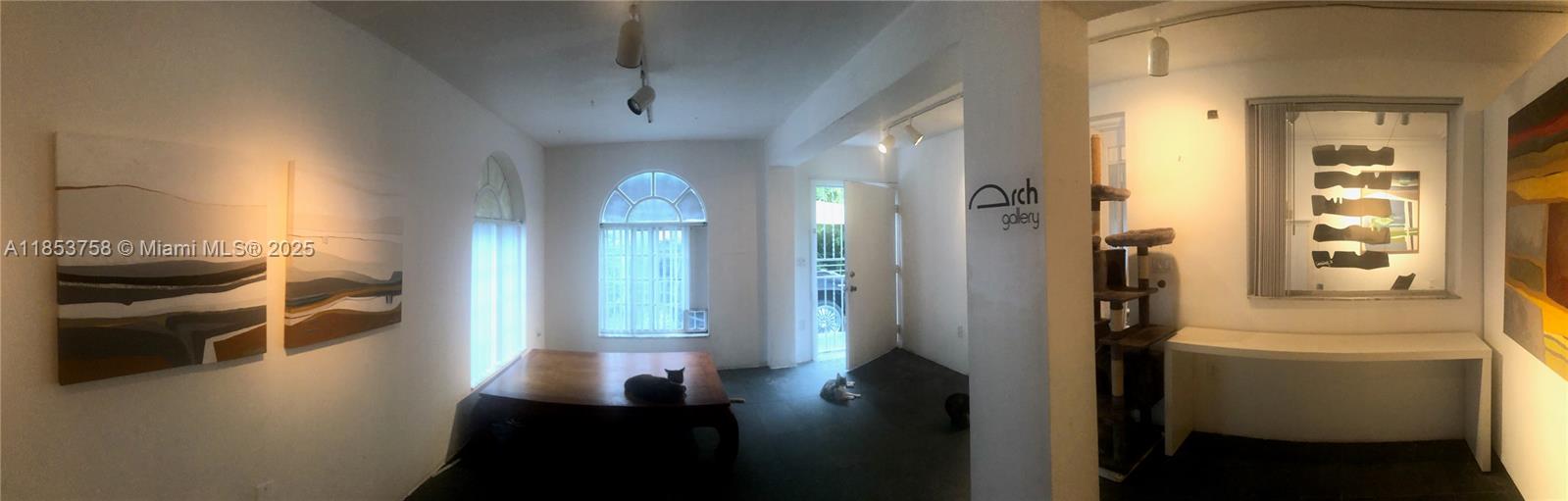 1619 Southwest 13th Street Miami, FL 33145 - Photo 16 of 46 a view of a hallway and a livingroom with furniture