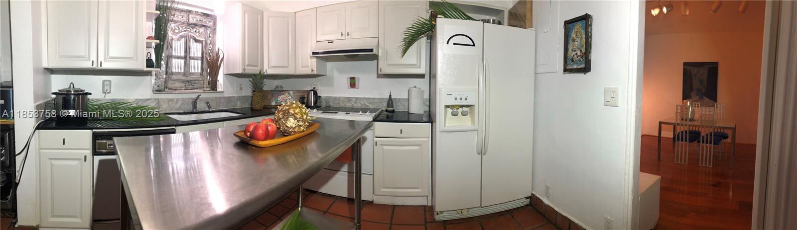 1619 Southwest 13th Street Miami, FL 33145 - Photo 22 of 46 a view of a kitchen with appliances and cabinets