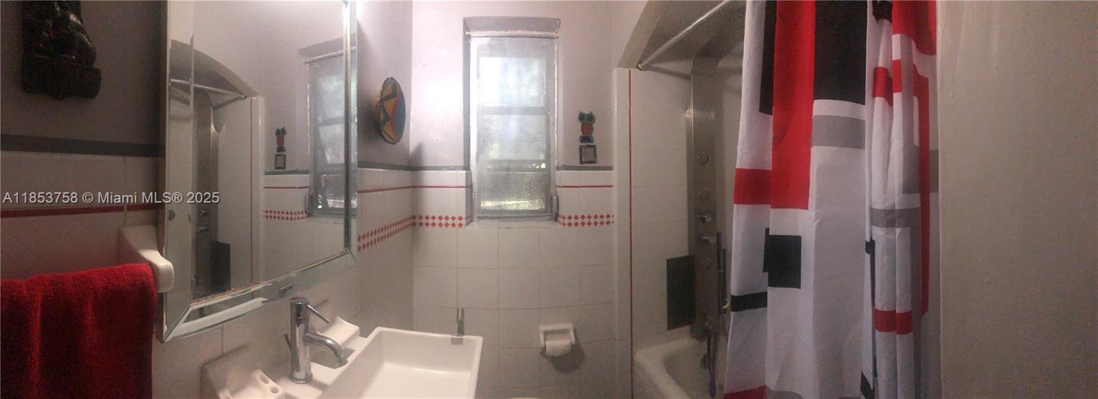 1619 Southwest 13th Street Miami, FL 33145 - Photo 30 of 46 a bathroom with a shower