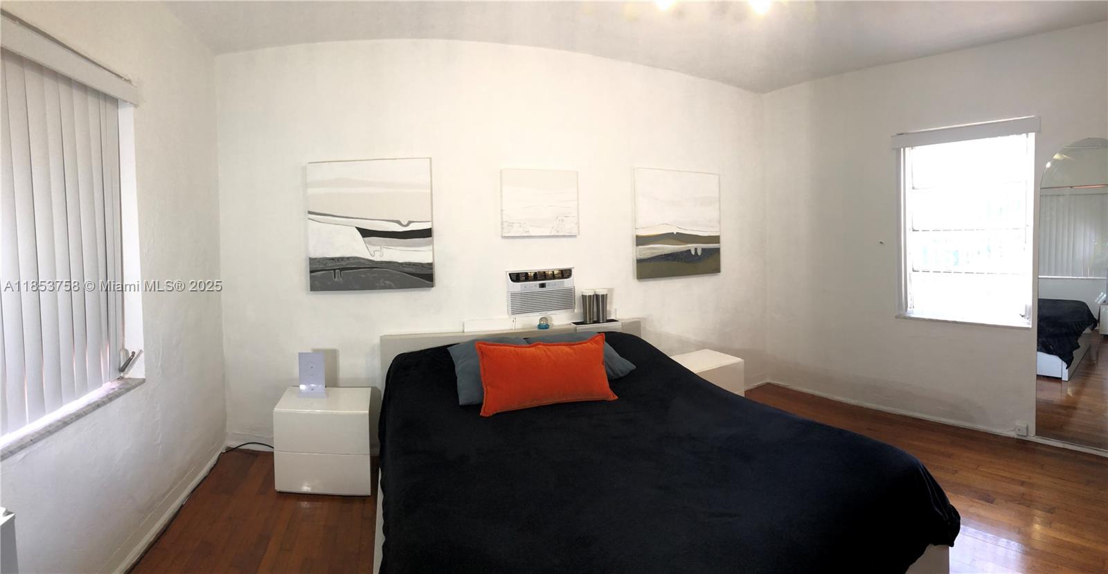 1619 Southwest 13th Street Miami, FL 33145 - Photo 32 of 46 a bedroom with a bed and window