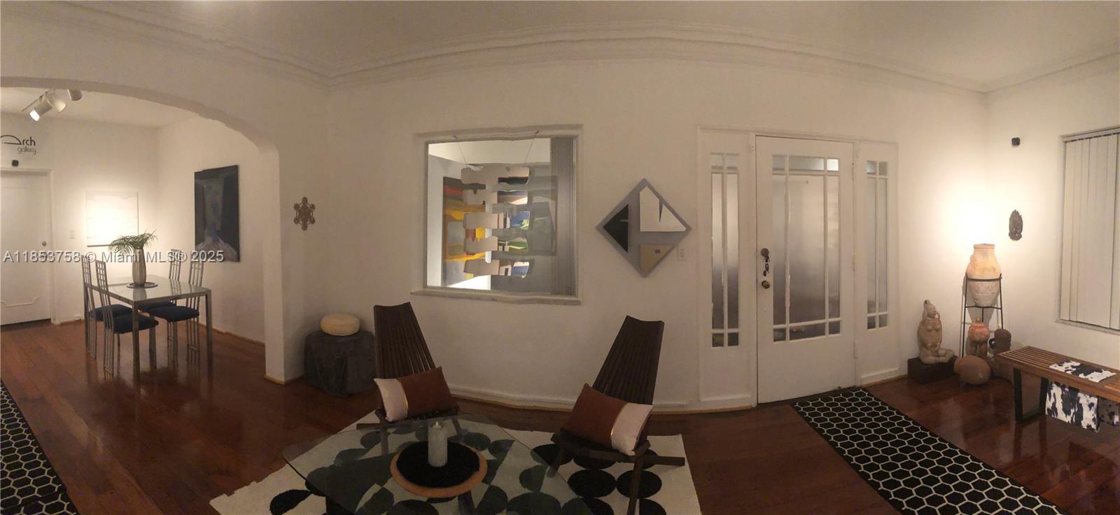 1619 Southwest 13th Street Miami, FL 33145 - Photo 8 of 46 a view of a livingroom with furniture and hardwood floor