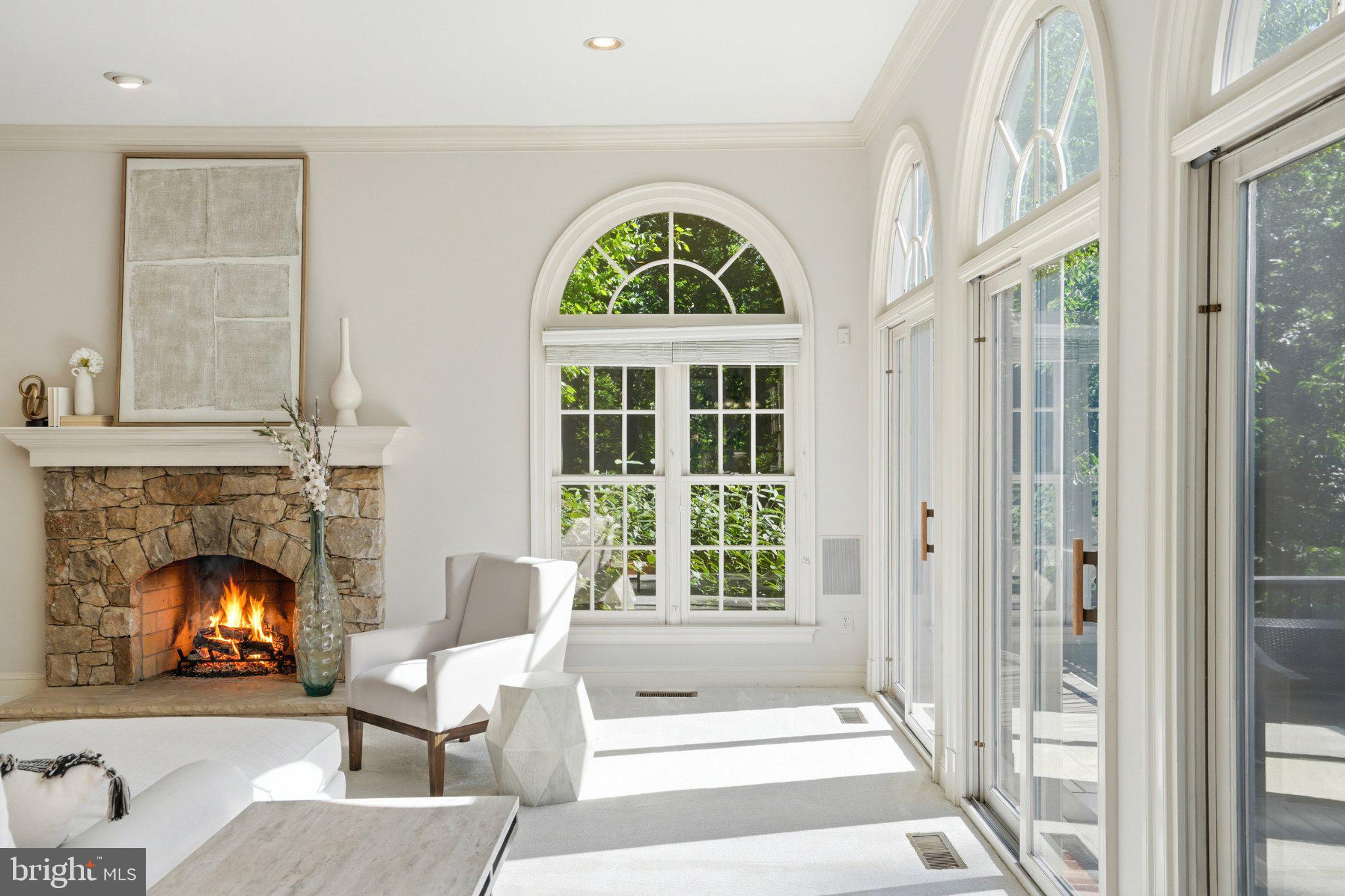 891 Chinquapin Road McLean, VA 22102 - Photo 30 of 78 Sunlit elegance with a cozy fireplace.