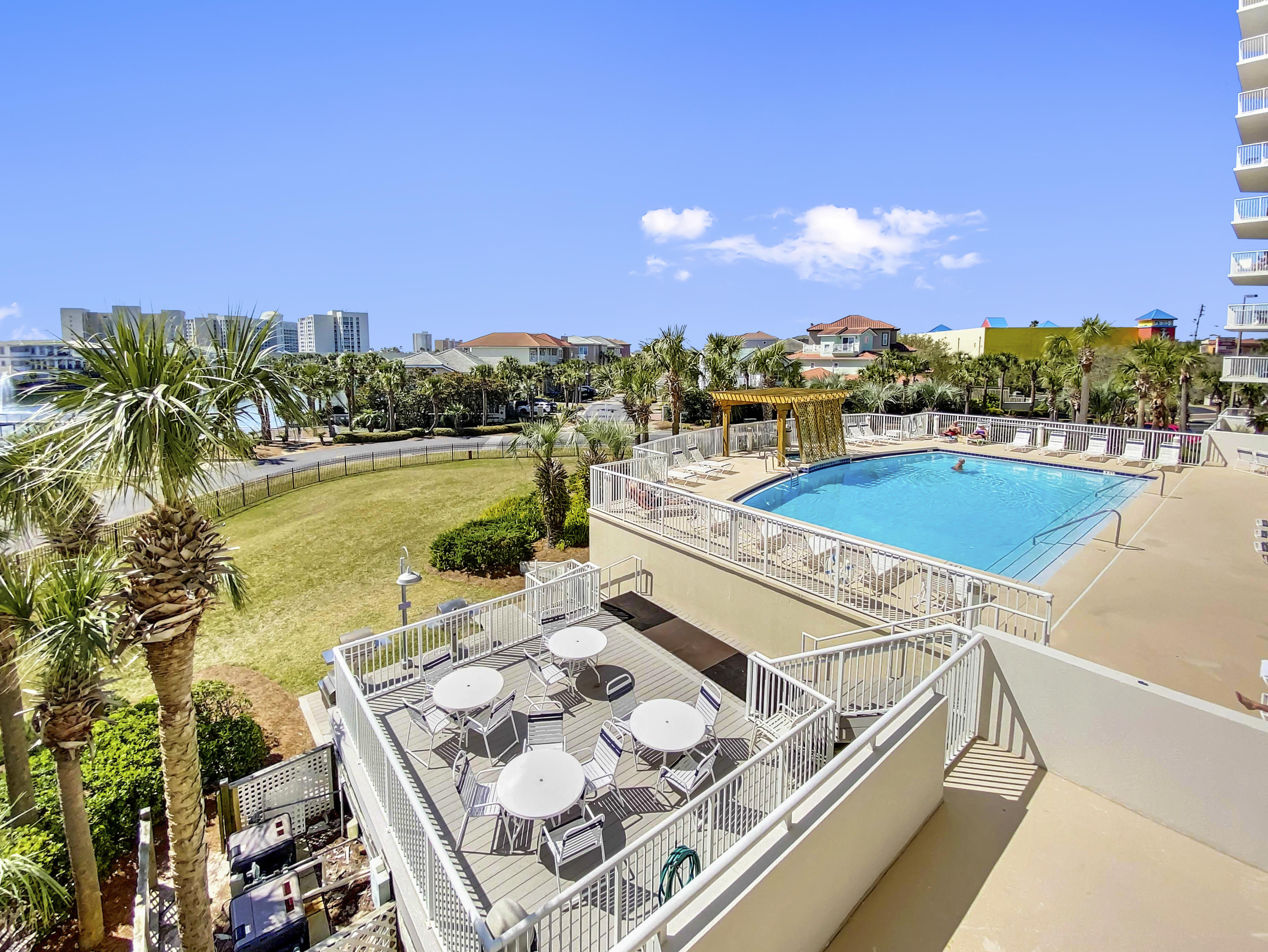 970 Highway 98, Unit 206 Destin, FL 32541 - Photo 14 of 25 a view of a swimming pool and an ocean