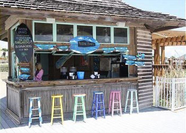 970 Highway 98, Unit 206 Destin, FL 32541 - Photo 22 of 25 a front view of a house with glass windows