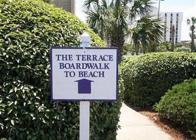 970 Highway 98, Unit 206 Destin, FL 32541 - Photo 23 of 25 a sign on the side of a building