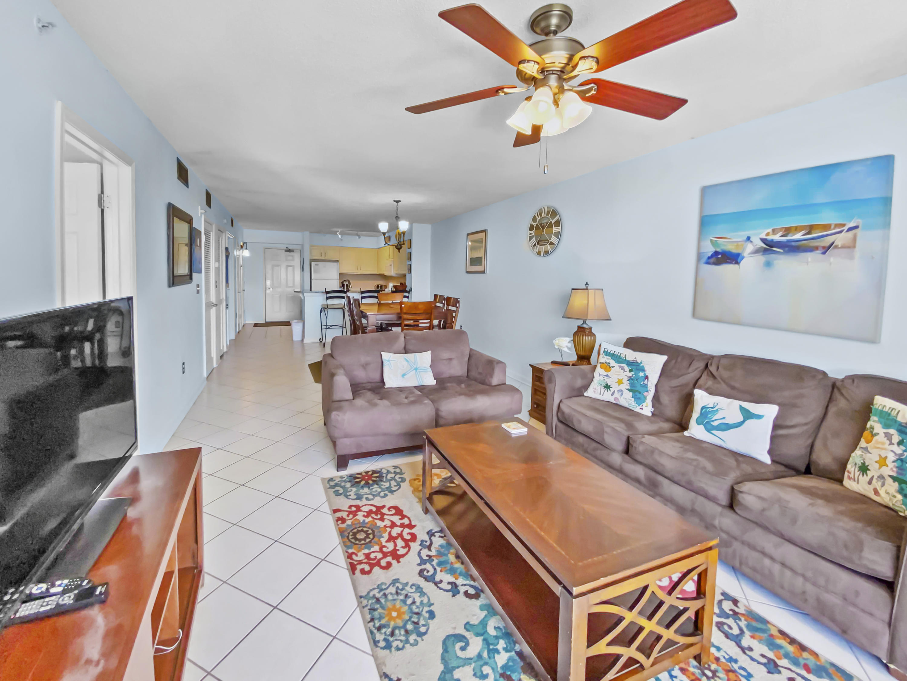 970 Highway 98, Unit 206 Destin, FL 32541 - Photo 3 of 25 a living room with furniture and a flat screen tv
