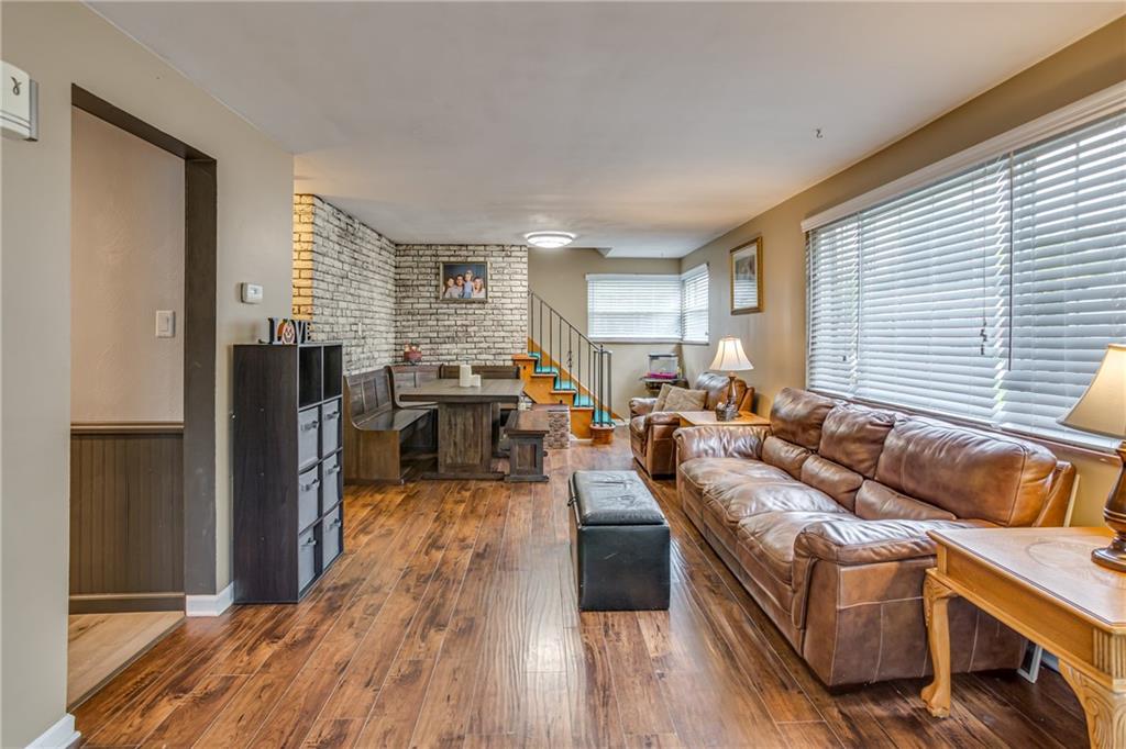 Living/Dining Combo Area with Lots of Natural Light and Beautiful Flooring