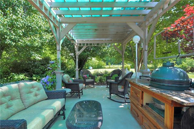 4845 Hickory Ridge Road Lebanon, TN 37087 - Photo 3 of 20 a view of a patio with couches chairs and a potted plant