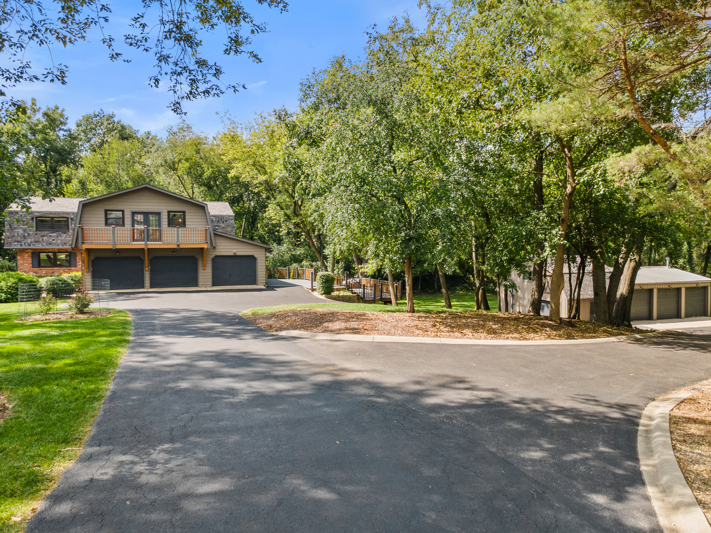 906 Bridle Lane Cary, IL 60013 - Photo 11 of 61 a front view of a house with a yard