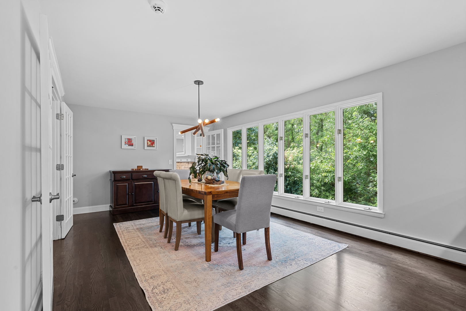 906 Bridle Lane Cary, IL 60013 - Photo 19 of 61 a dining room with furniture and wooden floor