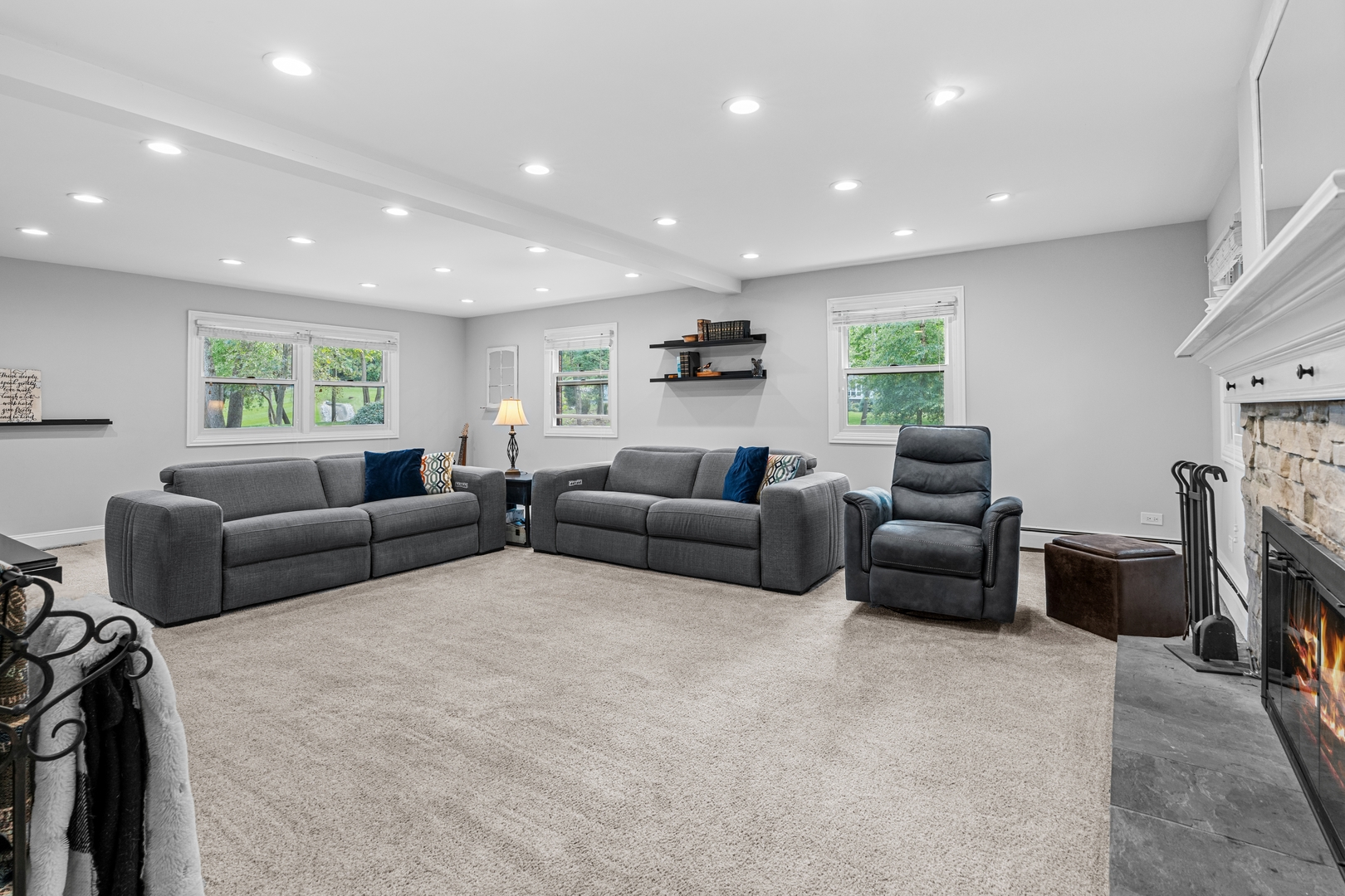 906 Bridle Lane Cary, IL 60013 - Photo 22 of 61 a living room with furniture and a fireplace