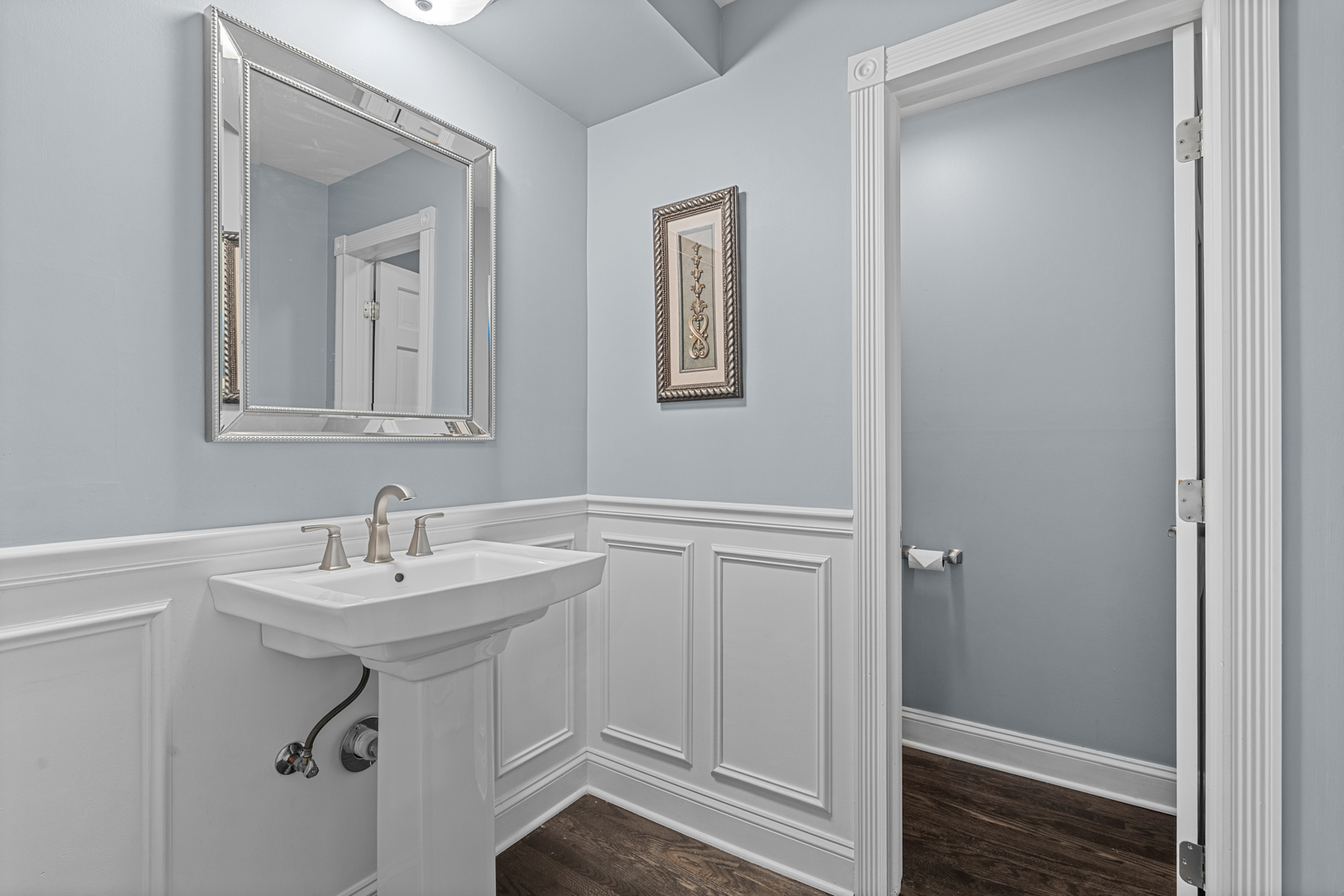 906 Bridle Lane Cary, IL 60013 - Photo 25 of 61 a bathroom with a sink and a mirror