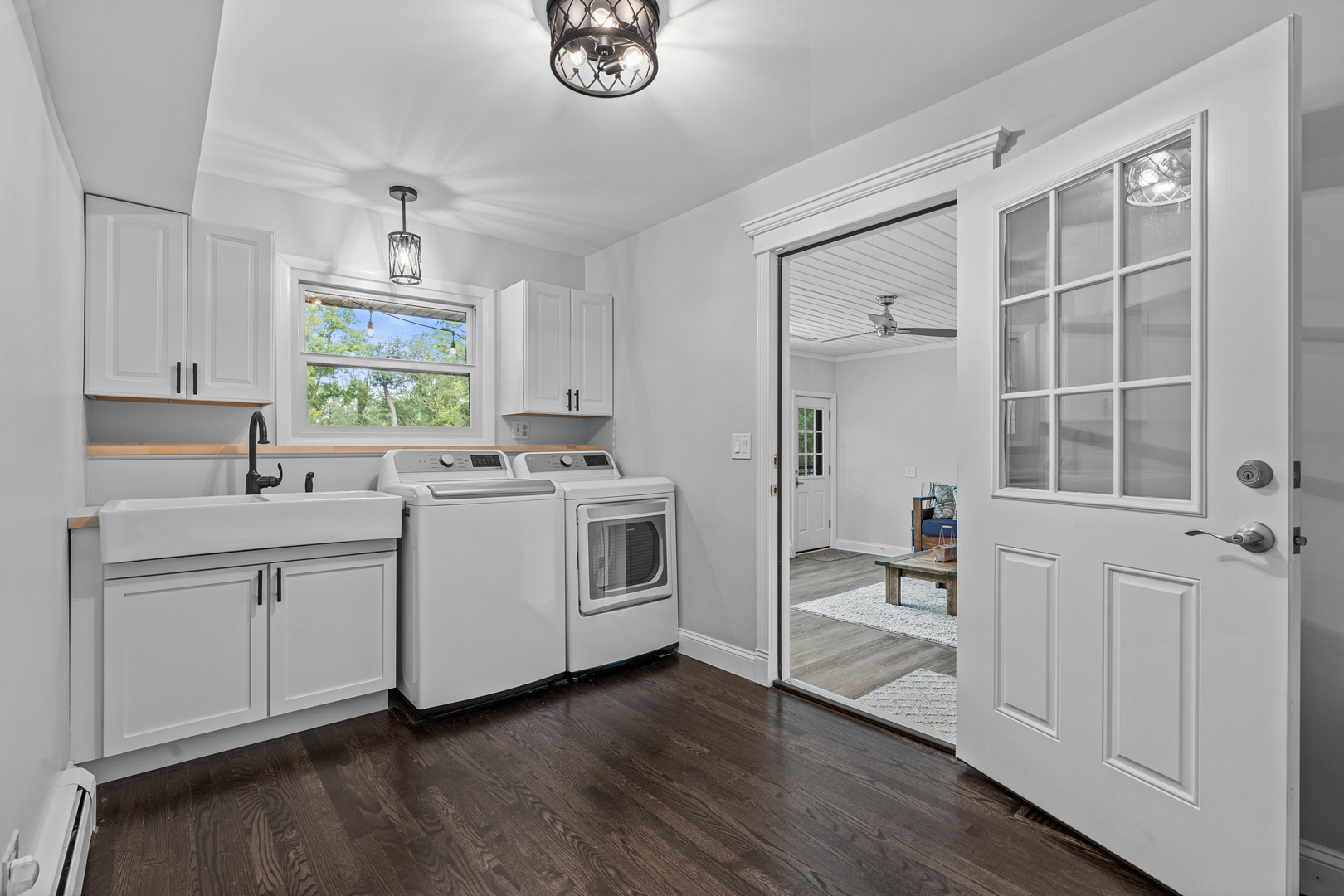 906 Bridle Lane Cary, IL 60013 - Photo 26 of 61 a kitchen with white cabinets and white appliances