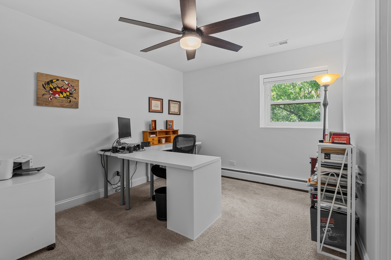 906 Bridle Lane Cary, IL 60013 - Photo 32 of 61 a view of a workspace with furniture and a window